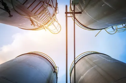 Storage tanks and piping at the Absolute Fluids facility